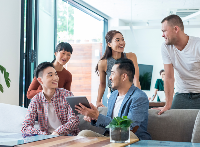 Coworkers at Sitting Area with Tablet