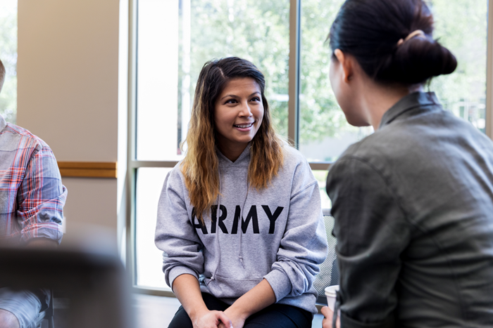 Army Veteran Young Woman in Discussion