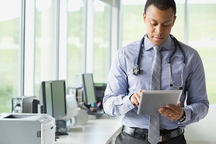 doctor using tablet