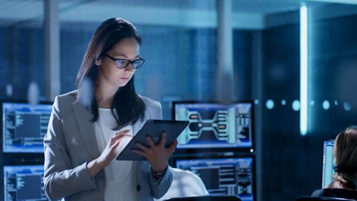 Business woman working on tablet