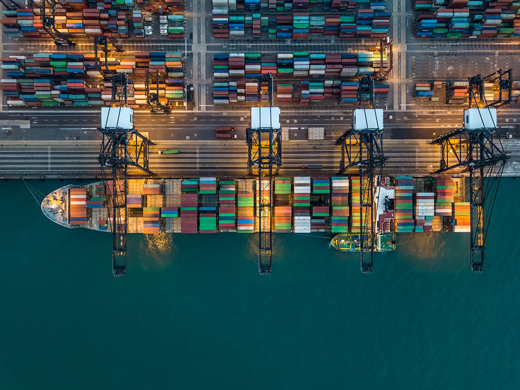Drone view of container vessels on ship at dock
