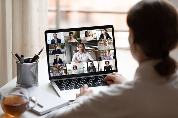 Business Woman on teams call with diverse colleagues