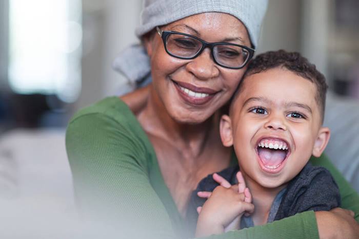 woman with cancer spending time with grandson