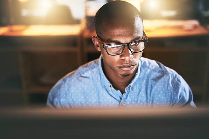 Young man focused on work