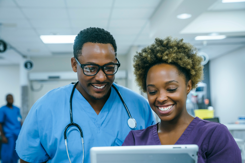 Nurses using digital tablet
