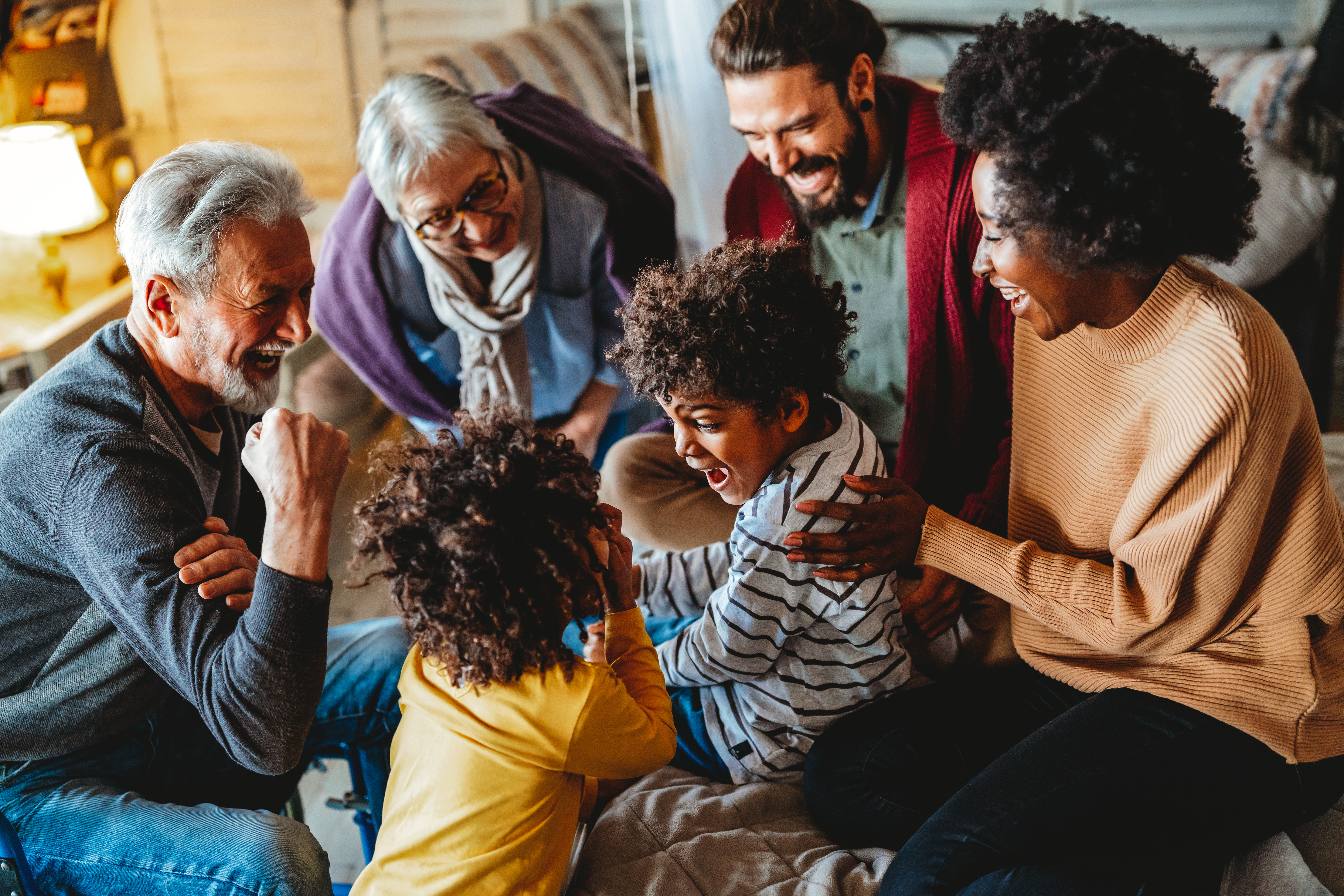 Multiethnic family having fun together at home