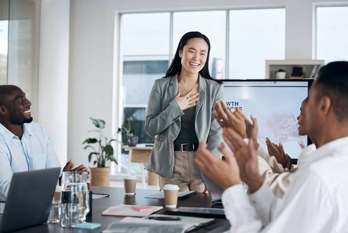 Presentation success applause or happy business woman