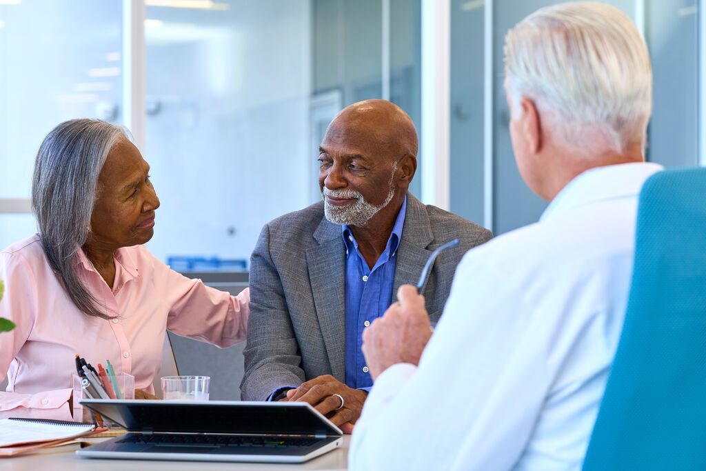 Custom Photo patient and doctor consulting in office setting