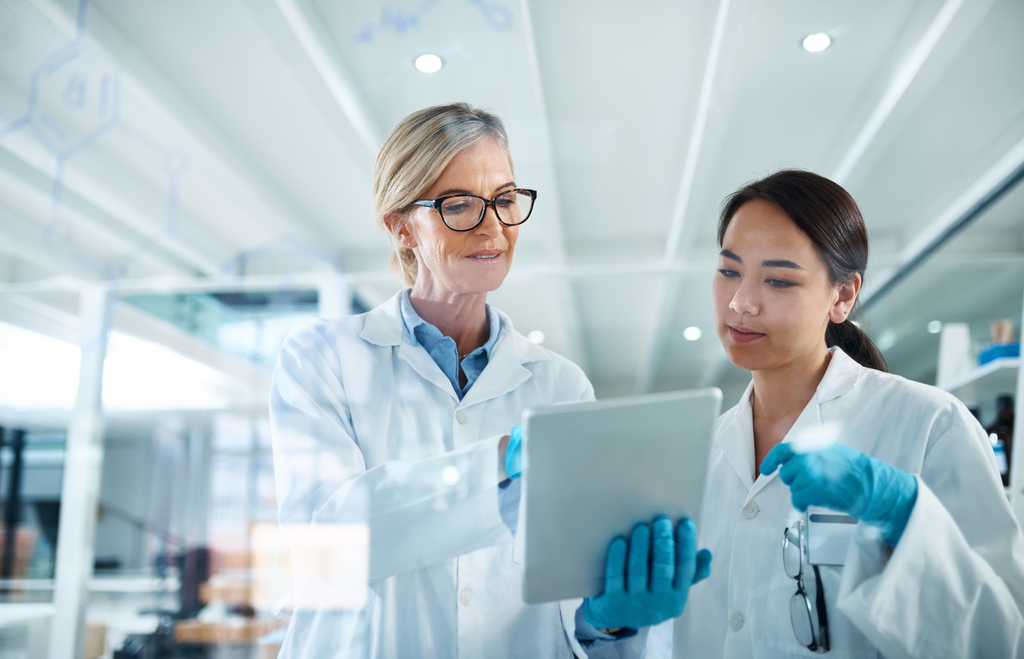 Doctors using a tablet