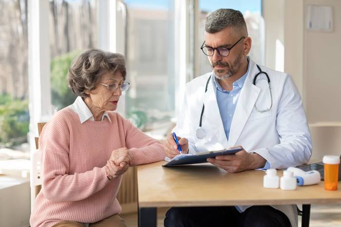 Doctor listening to a patient