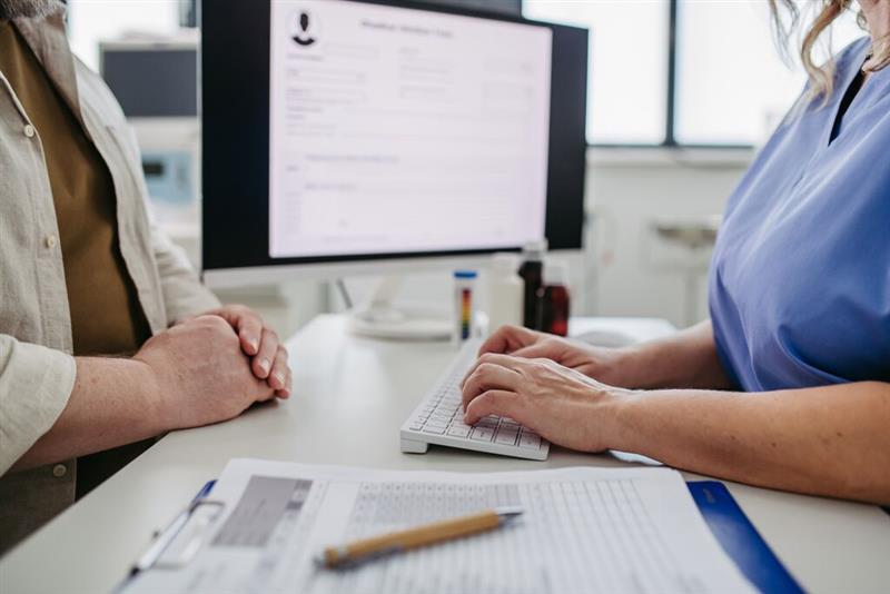 Doctor consulting with patient