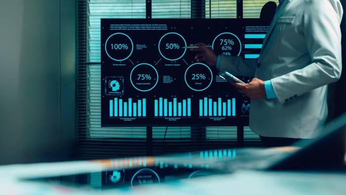 Business professional analyzes complex data visualizations