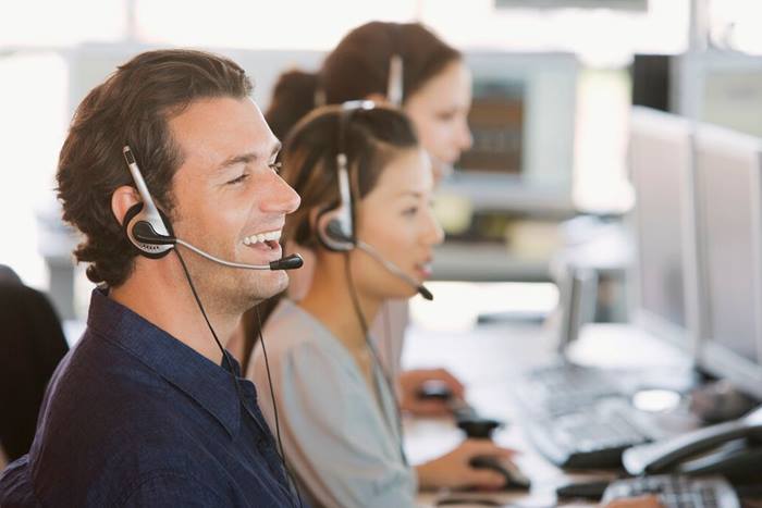 Website Featured JPG- Group of call center employees on headsets